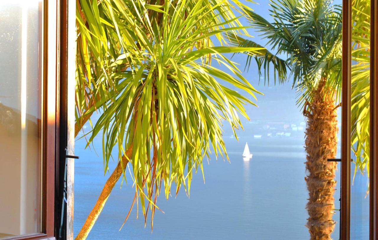 Apartment The Palm With Garden Sala Comacina Ngoại thất bức ảnh