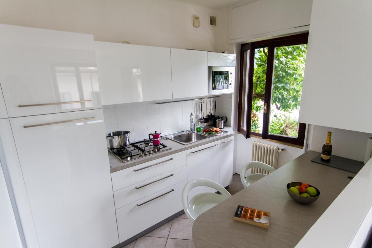 Apartment The Palm With Garden Sala Comacina Ngoại thất bức ảnh